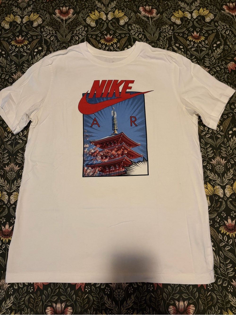 Nike White Graphic 'Air' Pagoda cherry blossom T-Shirt